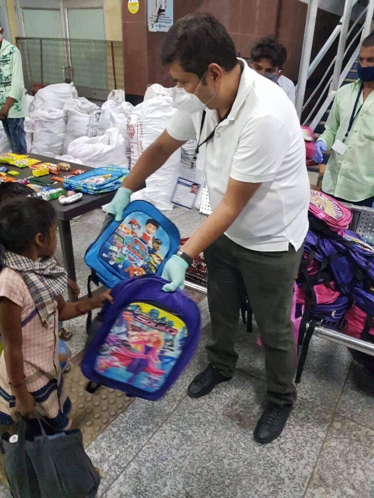 rakesh rajdev રાકેશ રાજદેવ distributing school bags
